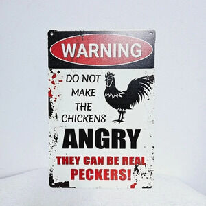 Metal warning angry chicken peckers sign